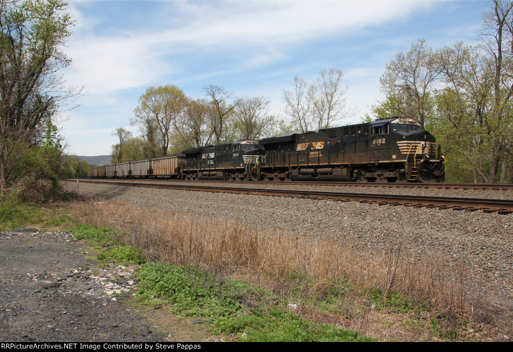 NS 8182 and 3645 take train 594 east with coal loads